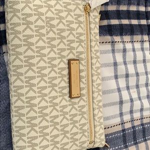 Brand new Michael Kors wristlet.